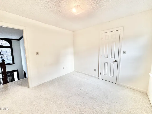 a view of a backyard with a small cabin