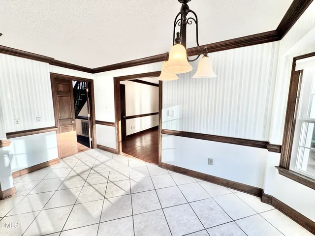 a view of a room with a large window