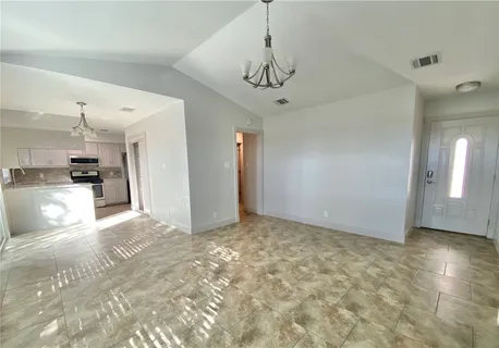 a kitchen with a stove microwave and refrigerator