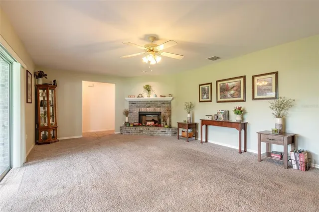 a view of a livingroom with furniture and windows
