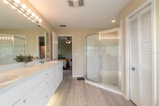 an aerial view of a house with a lake view