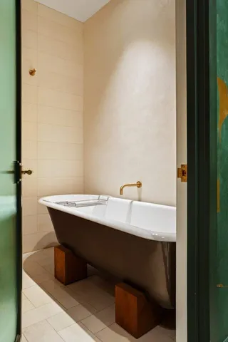 a room with a table and chairs