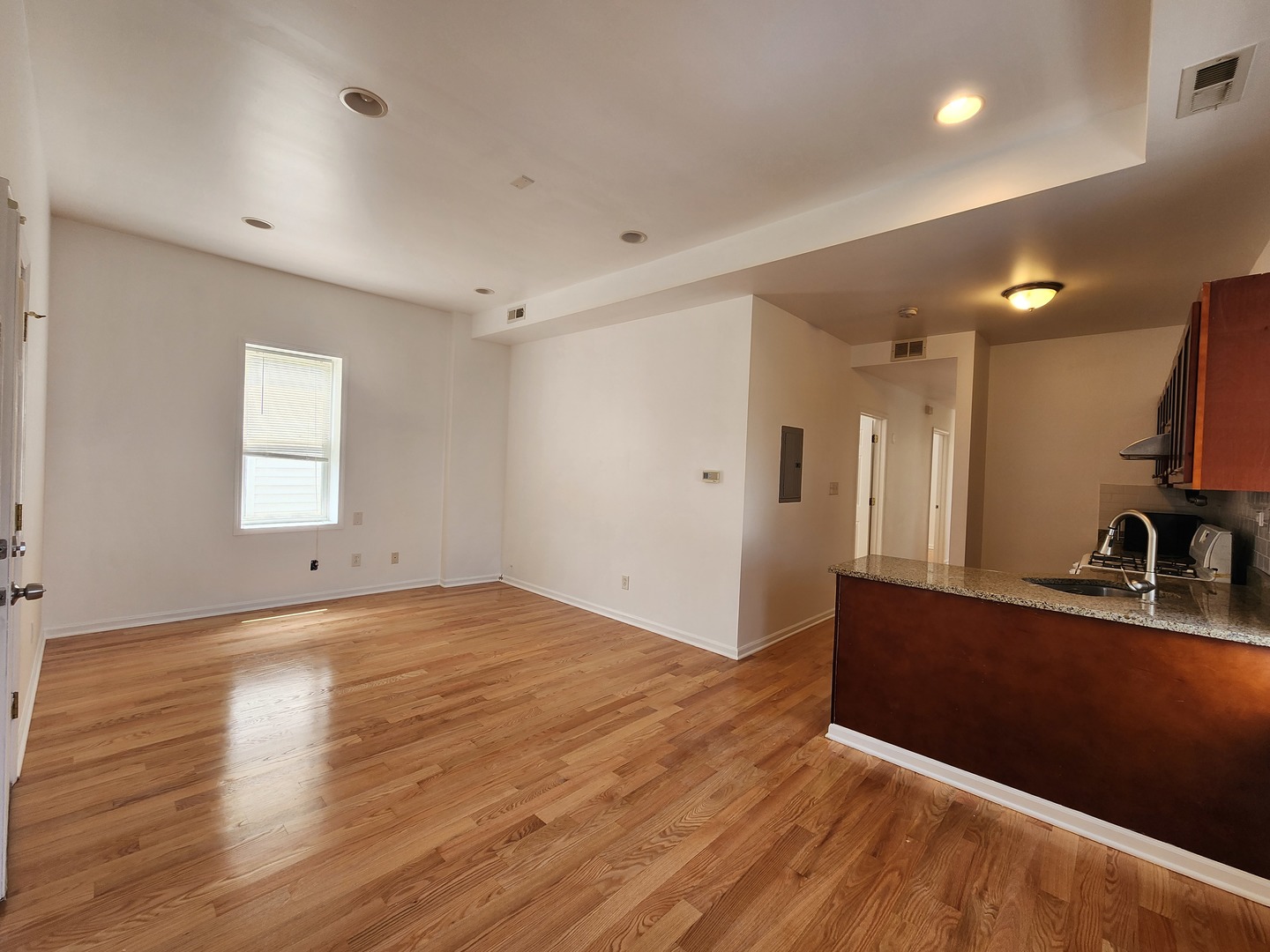 2713 South Crowell Street Chicago, IL 60608 - Photo 23 of 50 a view of a kitchen with a sink and a window