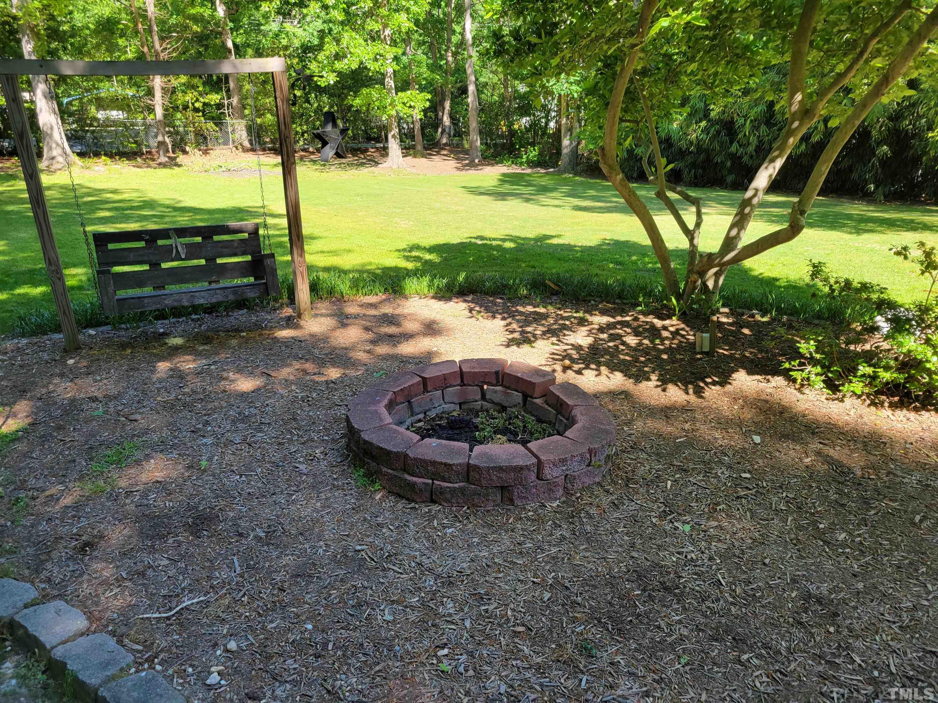 5515 Roslyn Road Durham, NC 27712 - Photo 5 of 38 a view of a backyard