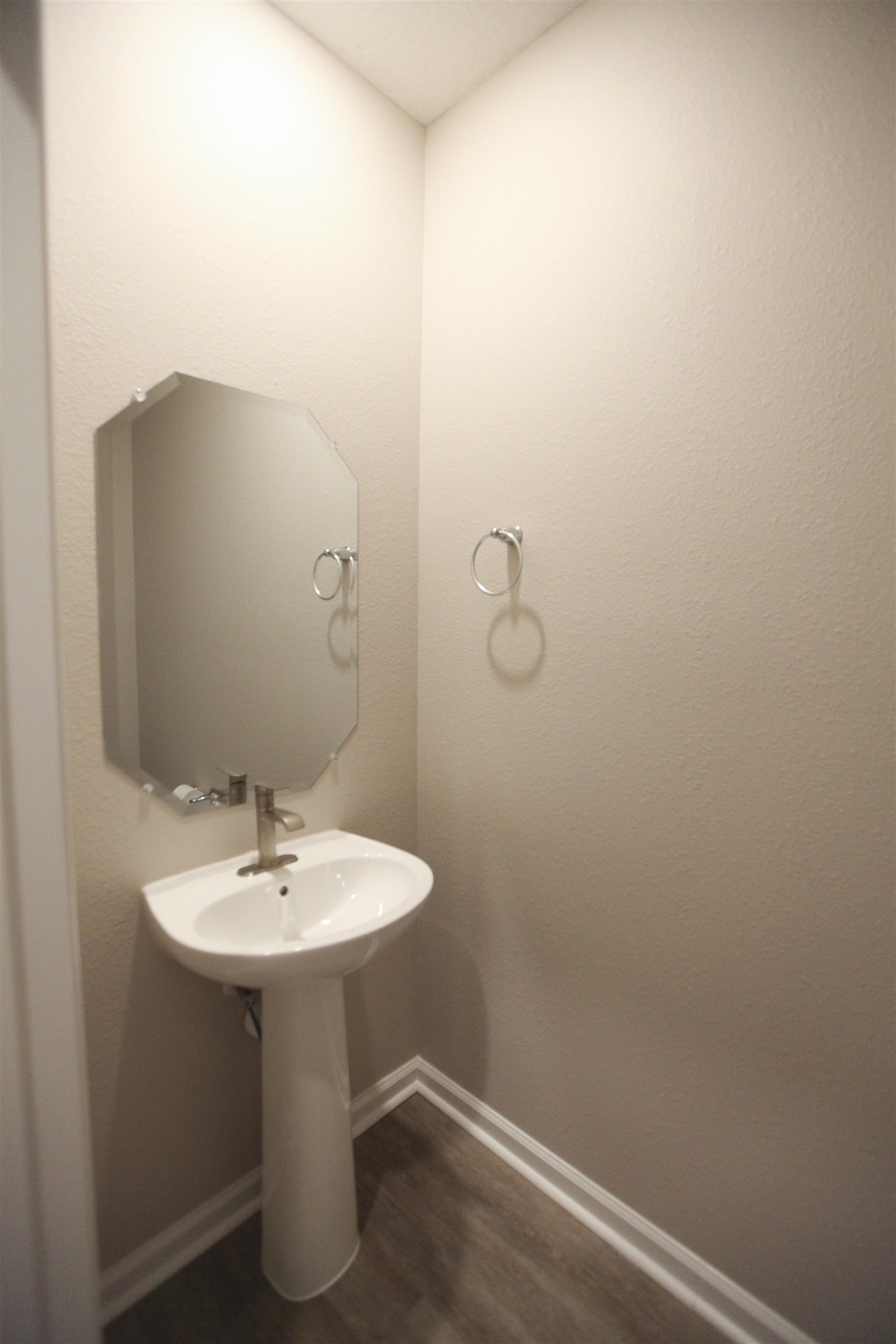 55 Great Star Street St. Augustine, FL 32086 - Photo 14 of 37 a bathroom with a sink and mirror