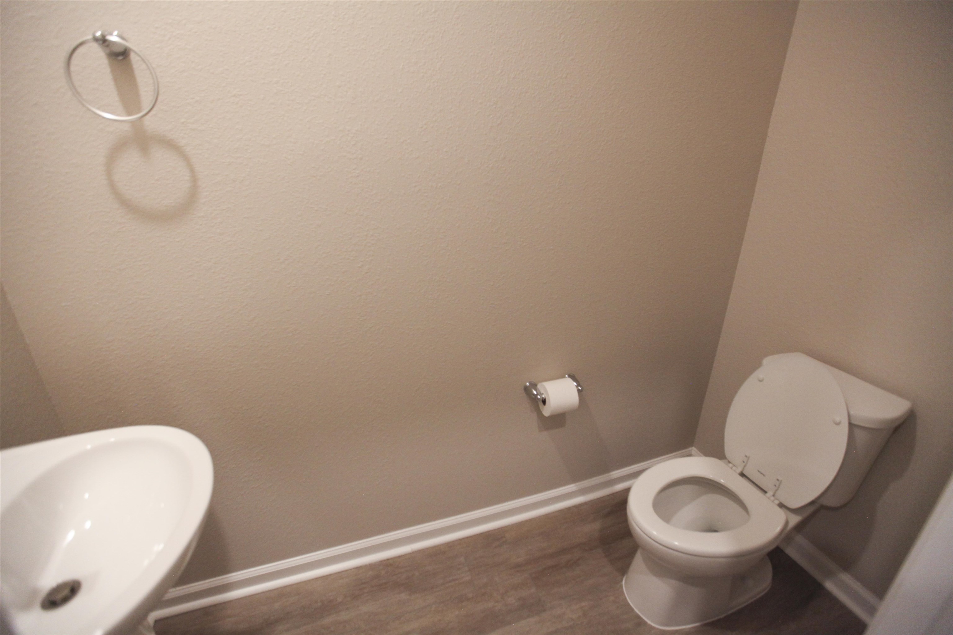 55 Great Star Street St. Augustine, FL 32086 - Photo 15 of 37 a white toilet sitting next to a white sink