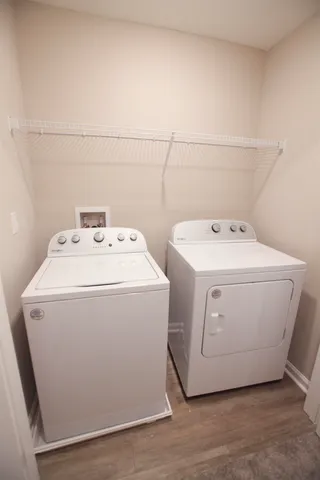 a utility room with dryer and washer