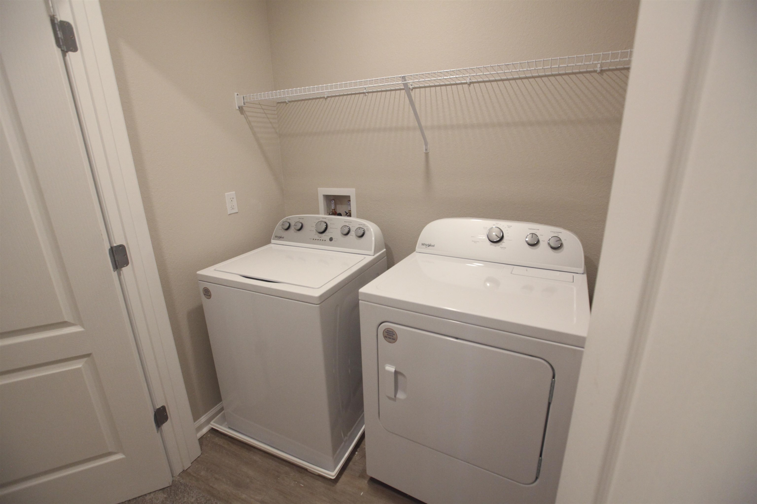 55 Great Star Street St. Augustine, FL 32086 - Photo 26 of 37 a utility room with dryer and washer