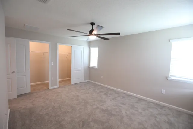 a view of a room with racks on the wall