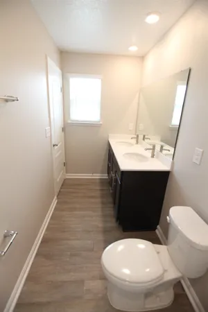 a white bath tub sitting in a bathroom