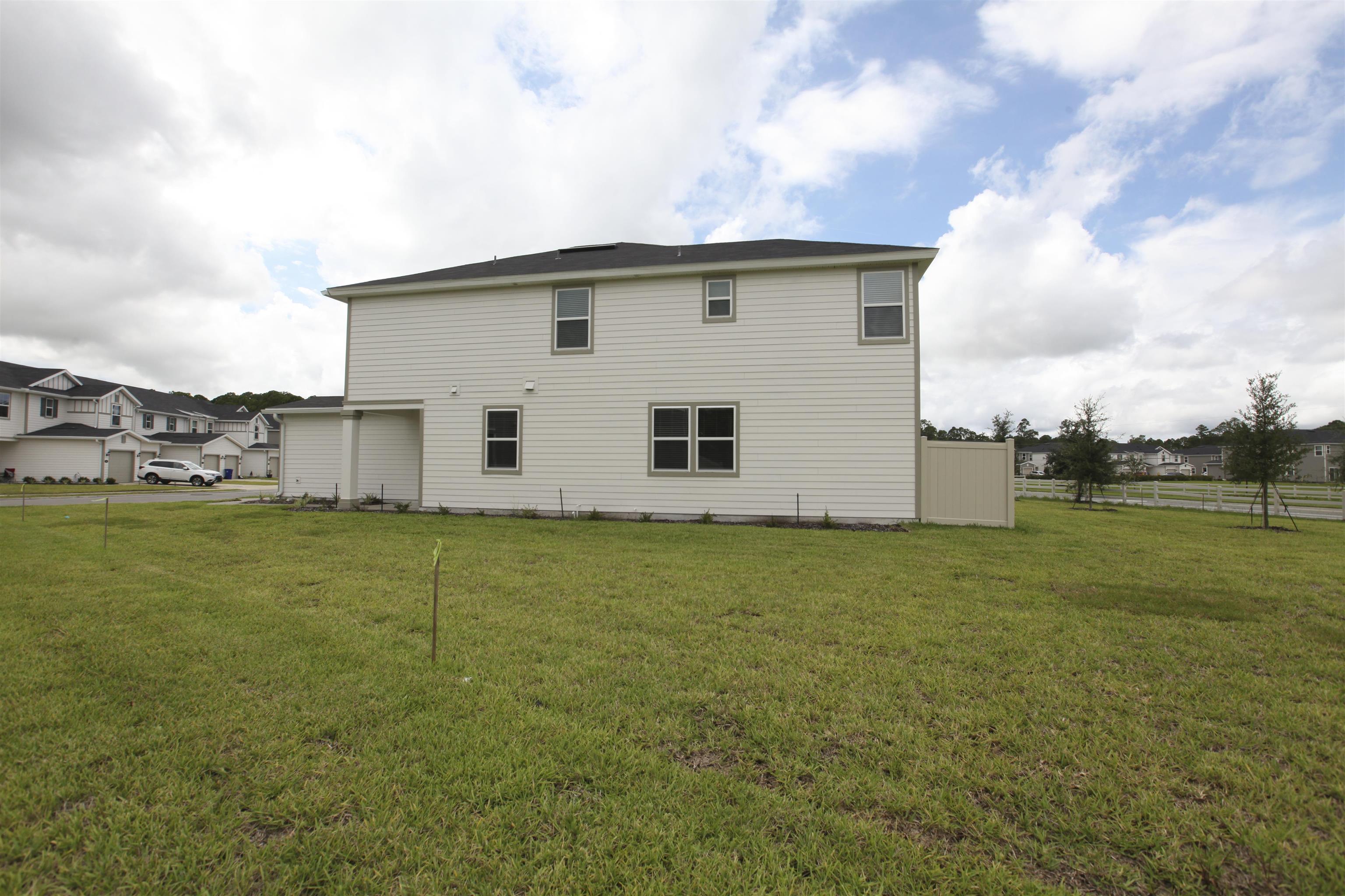 55 Great Star Street St. Augustine, FL 32086 - Photo 35 of 37 a view of a house with backyard