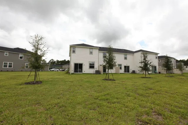 a house view with a garden space