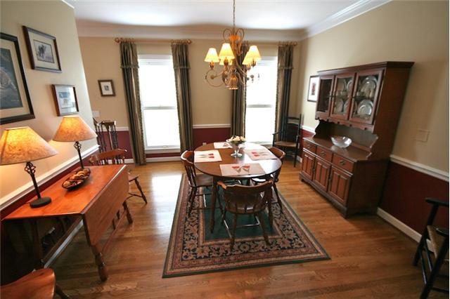 3123 Braintree Road Franklin, TN 37069 - Photo 4 of 20 FORMAL DINING ROOM WITH HARDWOOD FLOORING, CHAIRRAIL, CHANDELIER AND MORE.