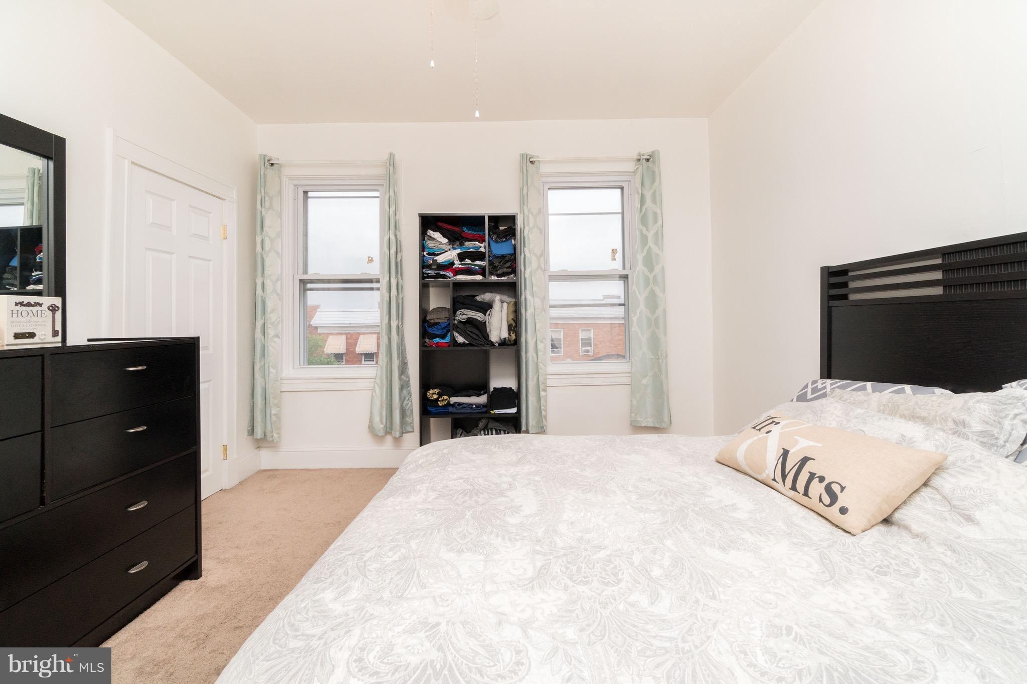 626 Rappolla Street Baltimore, MD 21224 - Photo 15 of 24 a bedroom with a bed and a closet