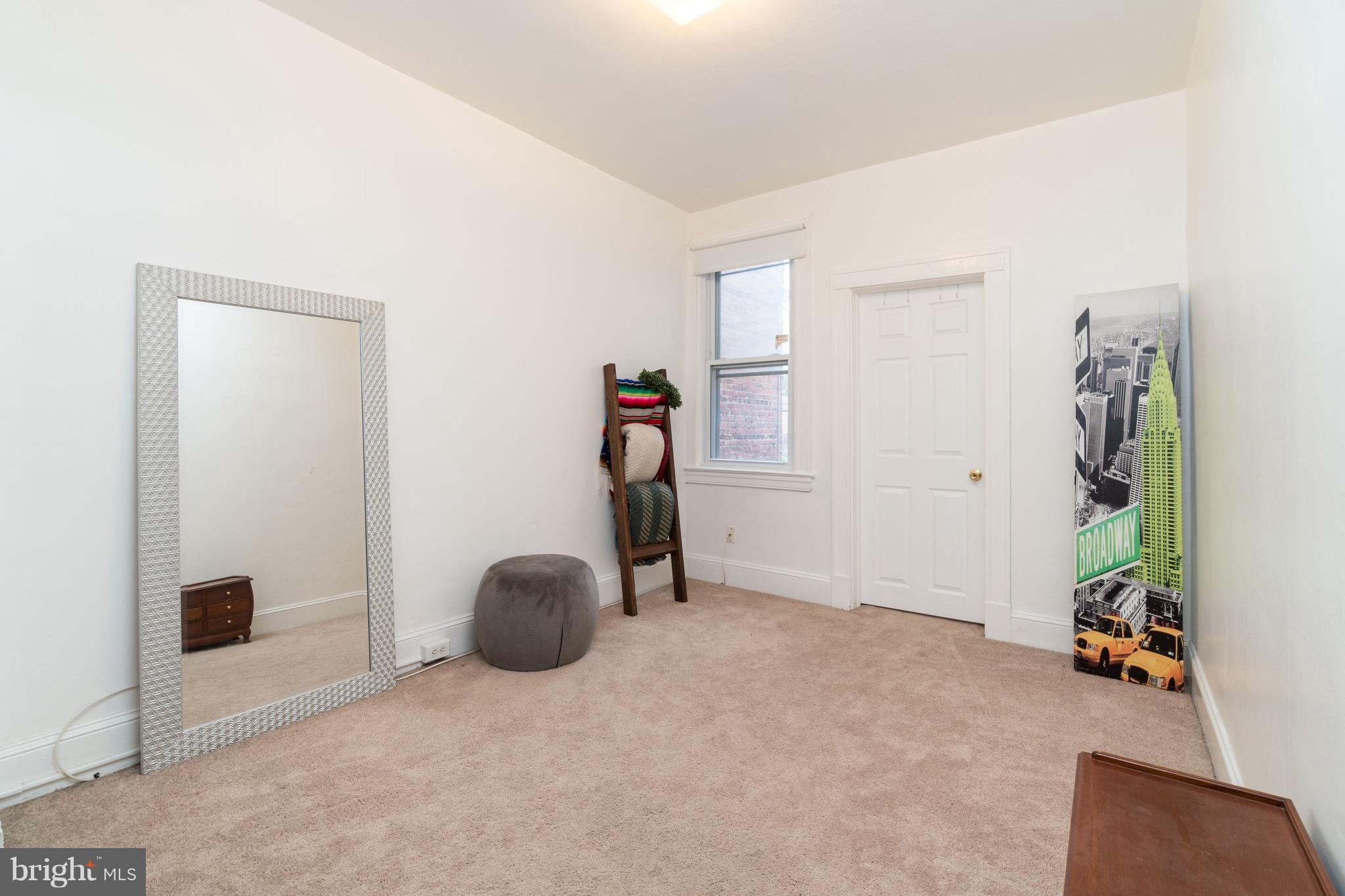 626 Rappolla Street Baltimore, MD 21224 - Photo 21 of 24 a view of livingroom with furniture and closet