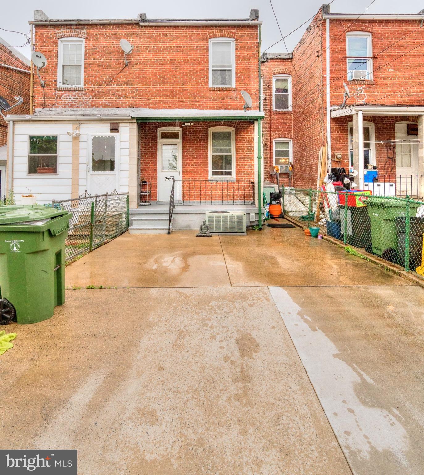 626 Rappolla Street Baltimore, MD 21224 - Photo 24 of 24 a backyard of a house with outdoor seating