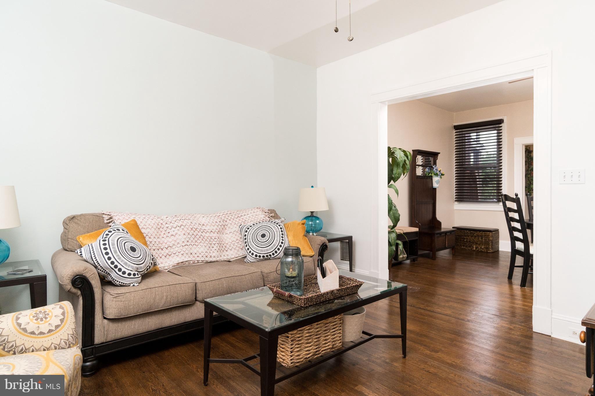 626 Rappolla Street Baltimore, MD 21224 - Photo 4 of 24 a living room with furniture and wooden floor