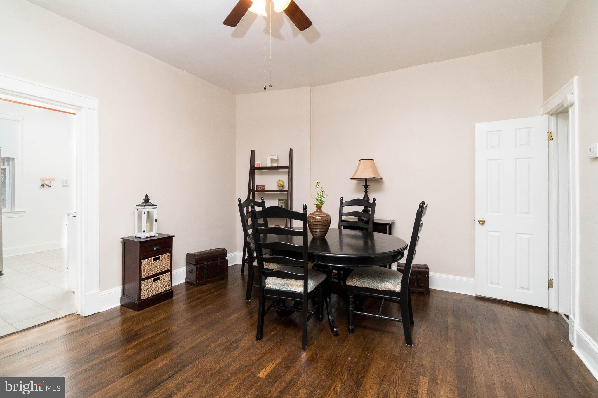 626 Rappolla Street Baltimore, MD 21224 - Photo 8 of 24 a view of a dining room with furniture and wooden floor