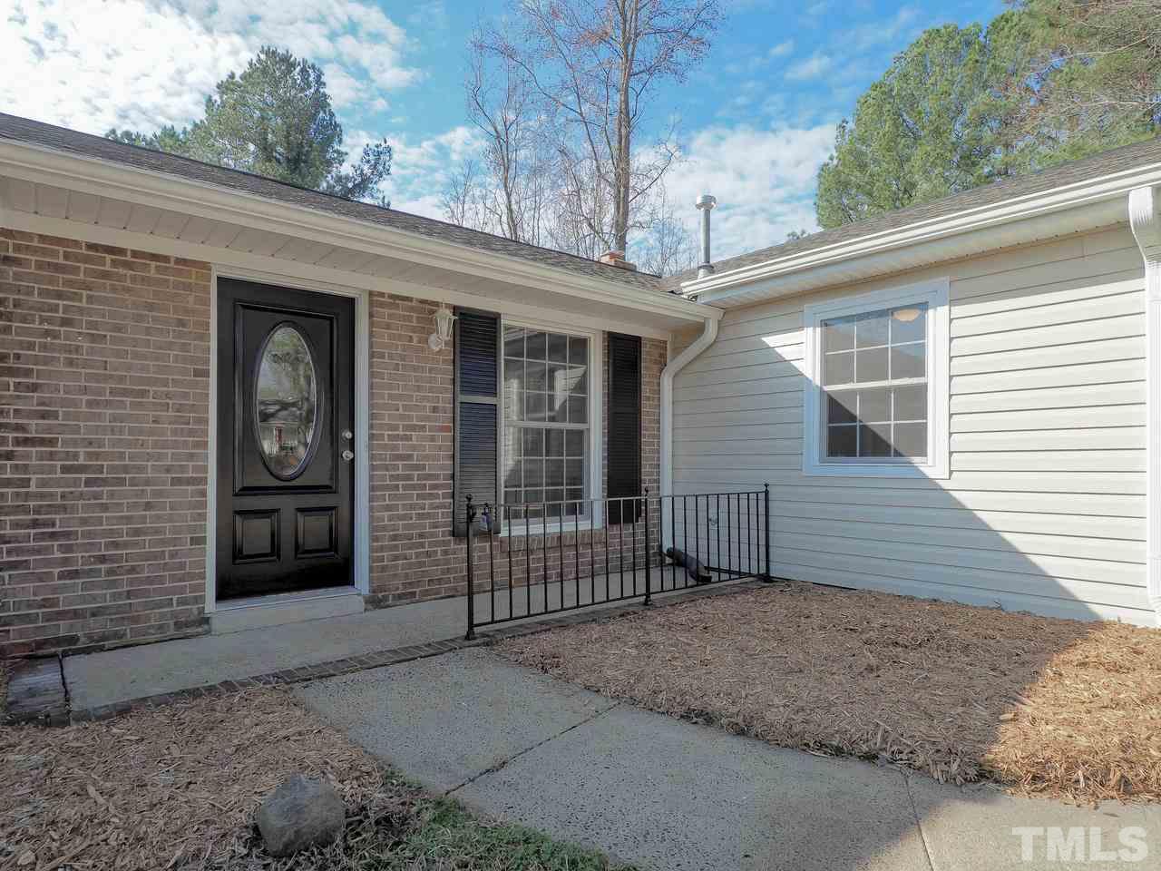 1111 Wyldewood Road Durham, NC 27704 - Photo 2 of 17 a front view of a house with entryway