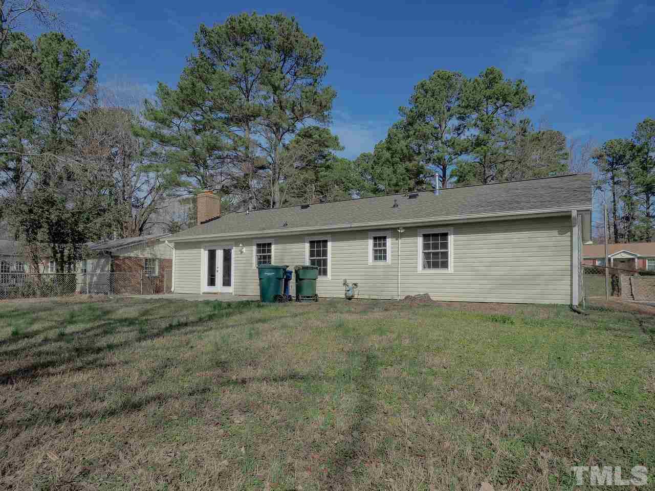 1111 Wyldewood Road Durham, NC 27704 - Photo 16 of 17 front view of a house with a yard