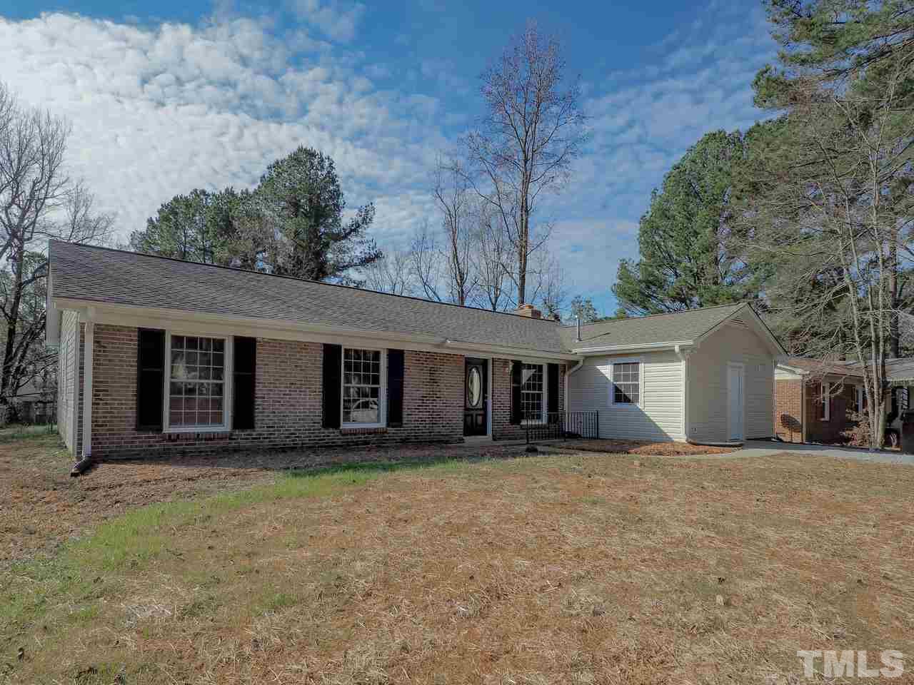 1111 Wyldewood Road Durham, NC 27704 - Photo 3 of 17 front view of a house with a yard