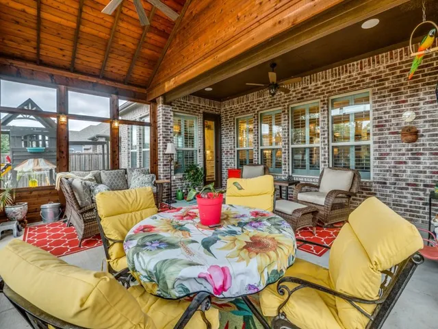a view of a kitchen with cabinets and white appliances