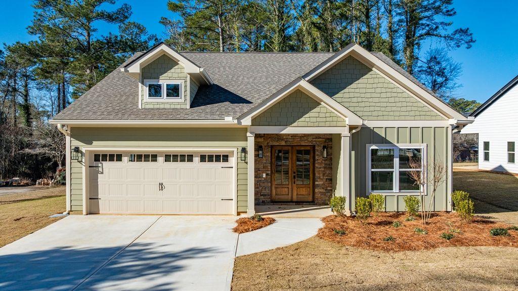 135 Beaver Street Carrollton, GA 30117 - Photo 1 of 1 a view of a house with a outdoor space