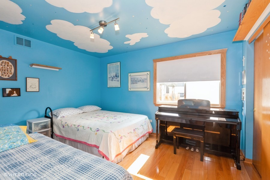 1871 Apple Valley Road Bolingbrook, IL 60490 - Photo 10 of 19 a bedroom with a bed and a desk