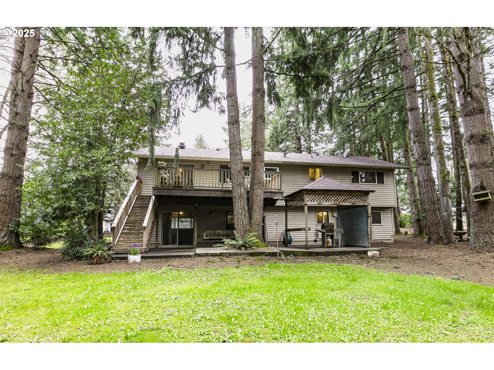 22285 Southeast Ridgeview Drive Damascus, OR 97089 - Photo 29 of 32 a view of a house with backyard