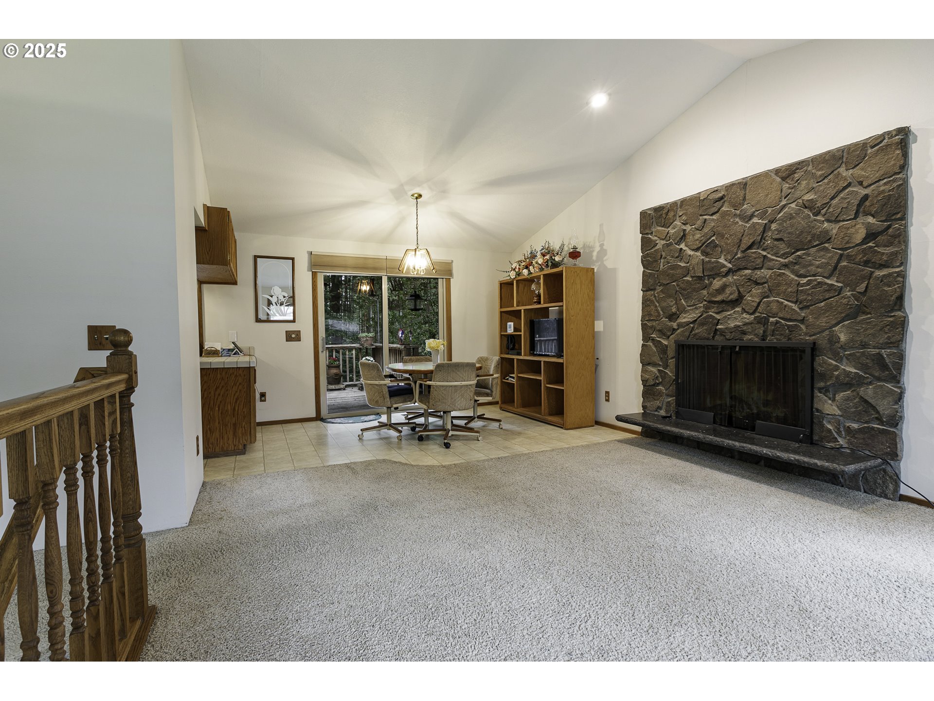 22285 Southeast Ridgeview Drive Damascus, OR 97089 - Photo 9 of 32 a view of a livingroom with furniture and a fireplace