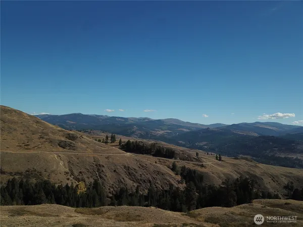 a view of ocean and mountain