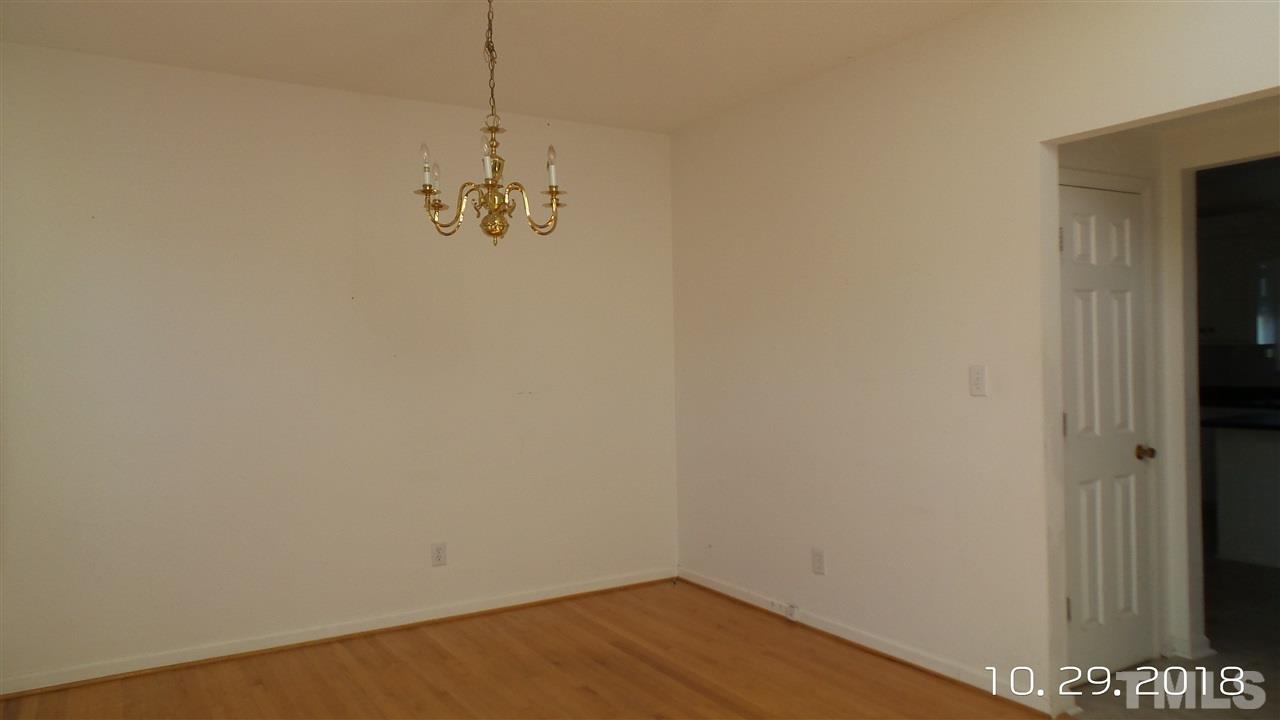 10305 Ten-Ten Road Raleigh, NC 27603 - Photo 8 of 17 a view of a room with wooden floor