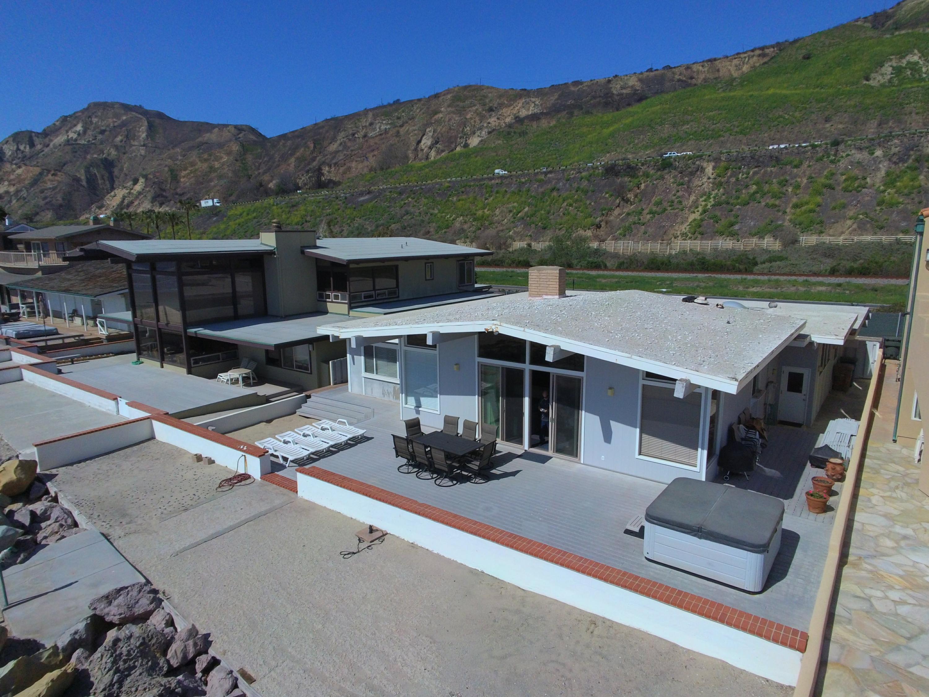 3108 Solimar Beach Drive Ventura, CA 93001 - Photo 4 of 22 an aerial view of a house with a garden