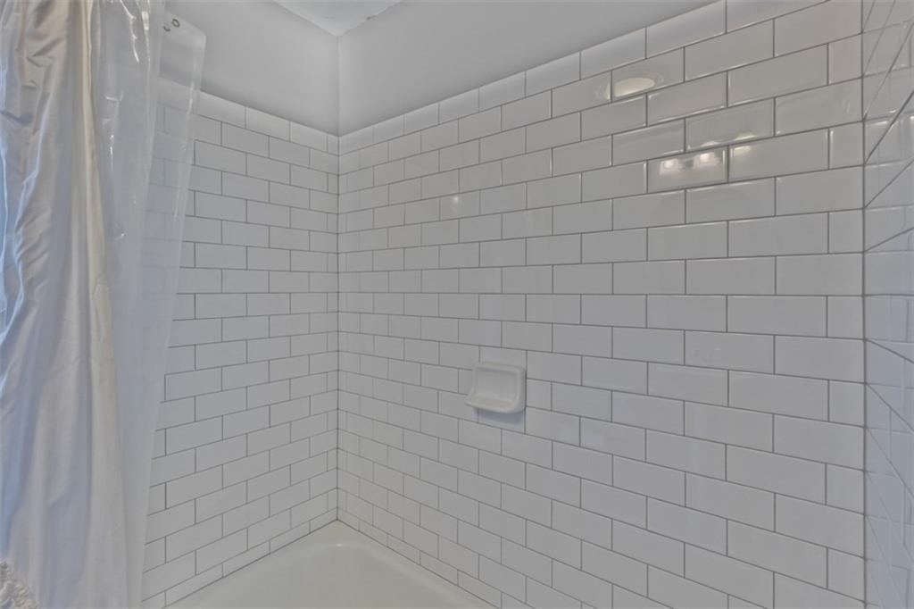 243 Main Street Cumberland Center, ME 04021 - Photo 17 of 28 New subway tile bath surround. Lovely!