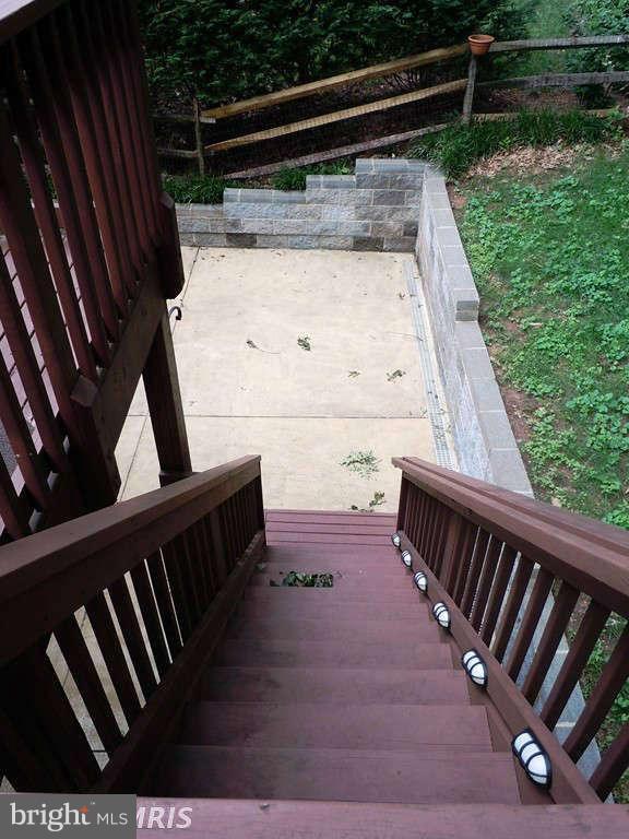 13315 Copper Ridge Road Germantown, MD 20874 - Photo 5 of 29 Stairs leading from Deck to Patio