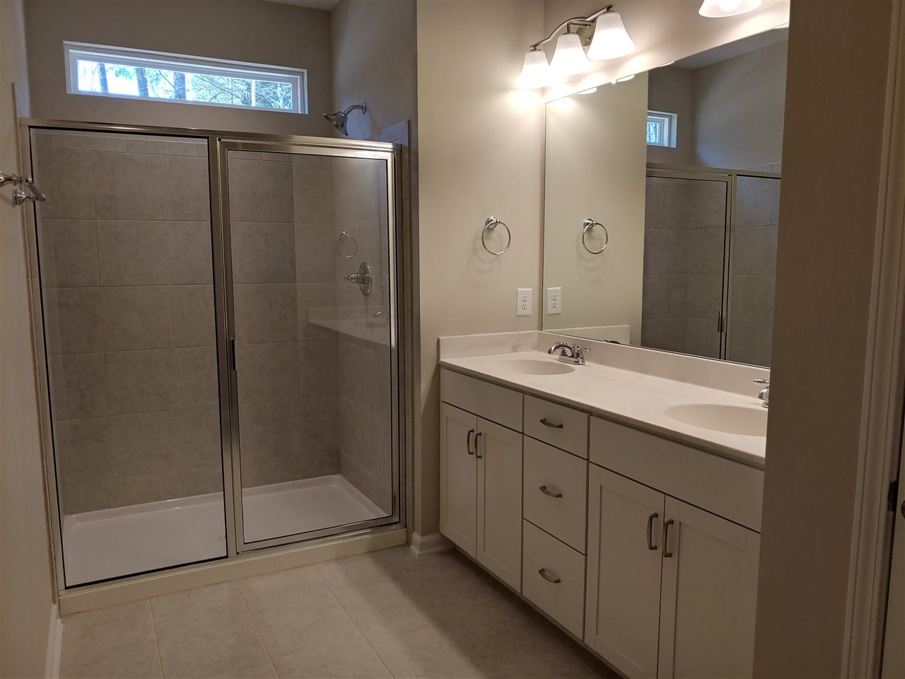 1204 Wingstem Place, Unit 2 Raleigh, NC 27607 - Photo 12 of 23 Upgrades Owner's Bath with Tile Walkin Shower and Floors