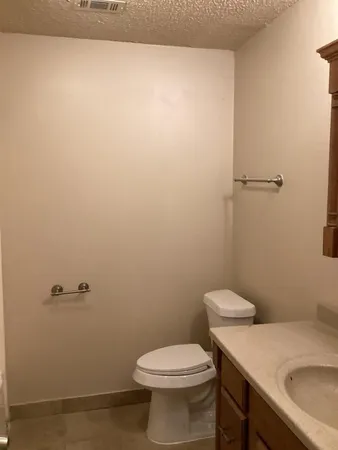 a bathroom with a sink and toilet
