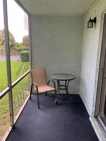 a view of a backyard with fountain