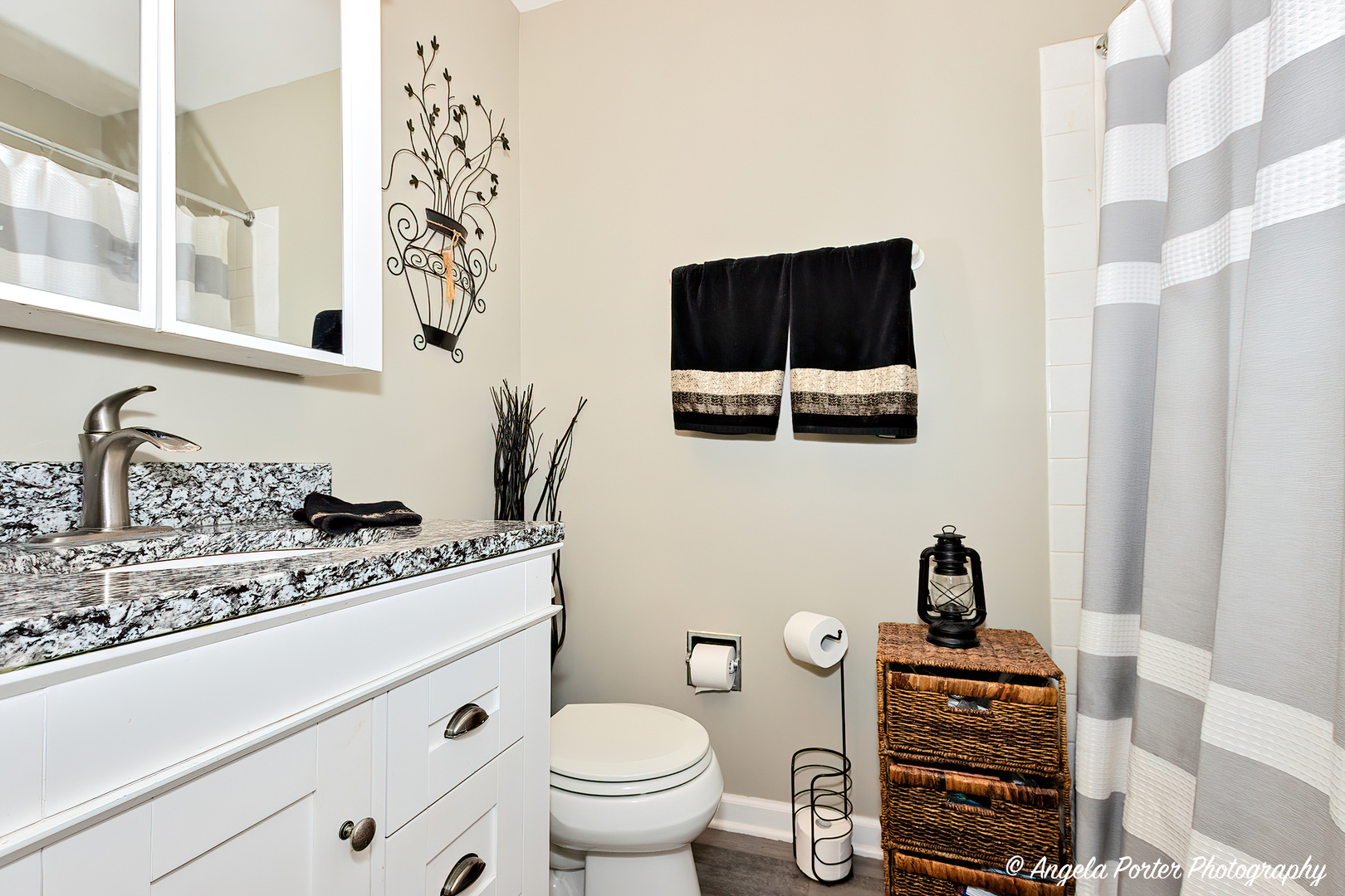 122 Bright Oaks Circle Cary, IL 60013 - Photo 20 of 28 a bathroom with a granite countertop sink and a mirror