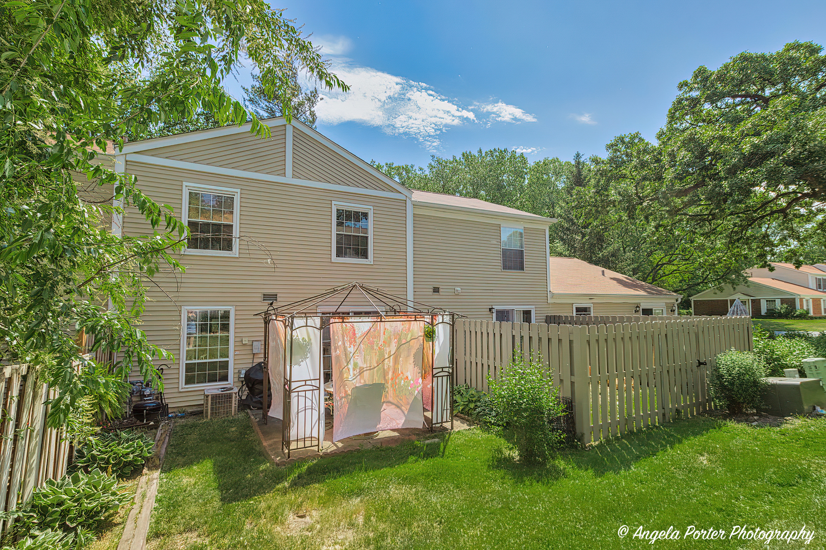 122 Bright Oaks Circle Cary, IL 60013 - Photo 25 of 28 a view of backyard with a garden and deck