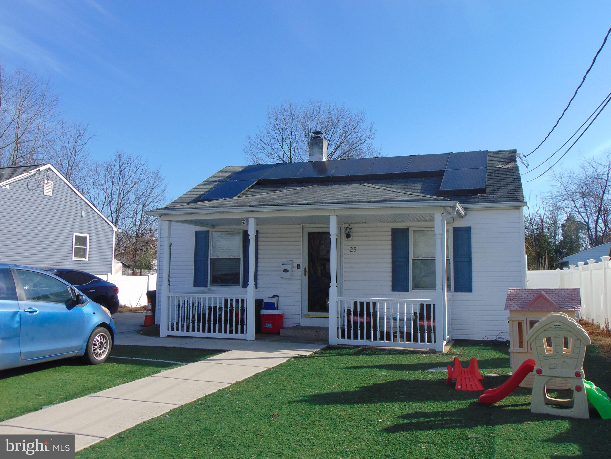 28 Franklin Avenue Clementon, NJ 08021 - Photo 23 of 26 a view of a house with a yard and porch