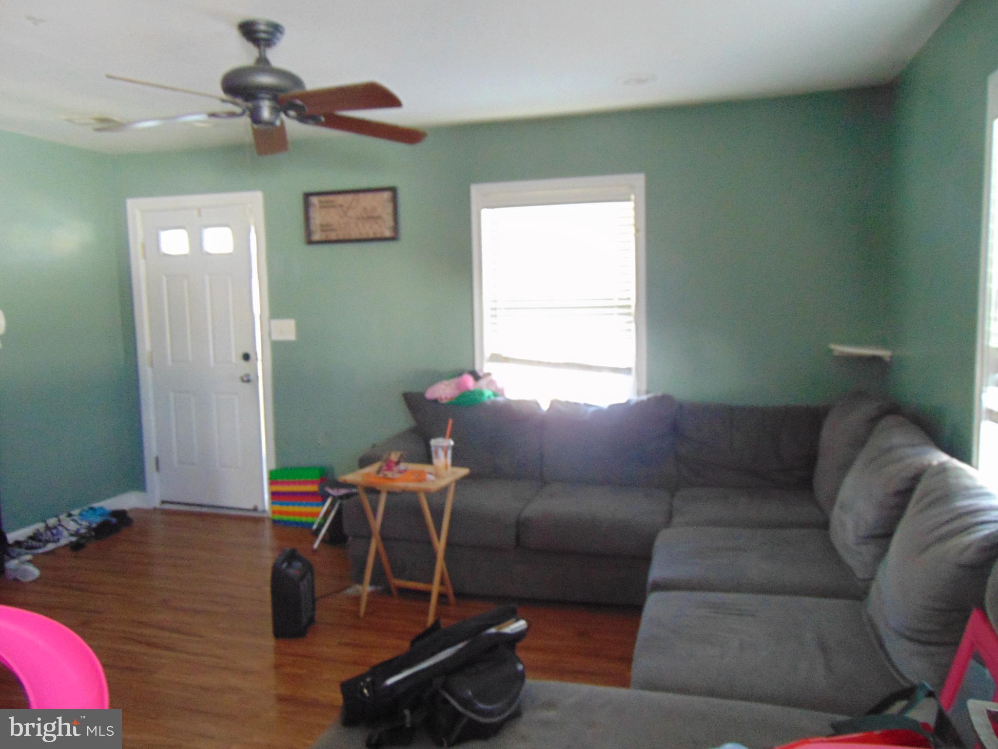 28 Franklin Avenue Clementon, NJ 08021 - Photo 4 of 26 a living room with furniture a air conditioner vent and a window
