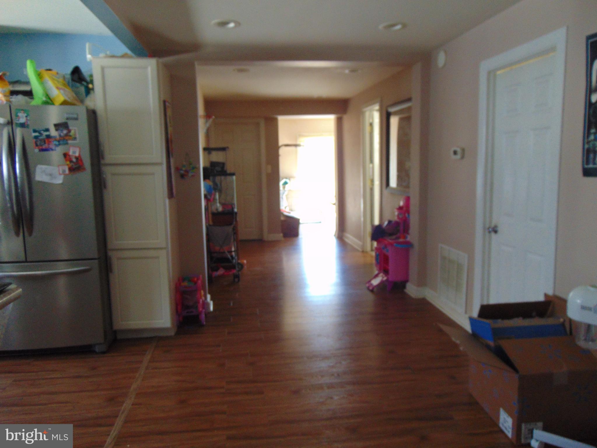 28 Franklin Avenue Clementon, NJ 08021 - Photo 5 of 26 a view of a hallway with wooden floor and closet