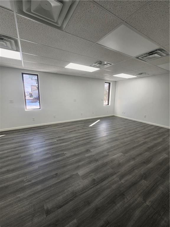 2921 Leechburg Road, Unit 2 Lower Burrell, PA 15068 - Photo 10 of 10 an empty room with wooden floor and windows