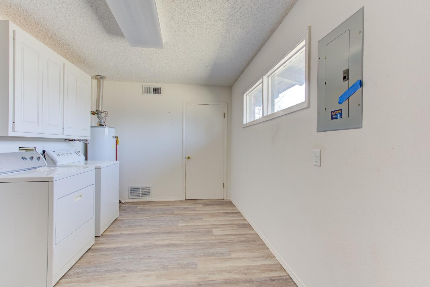 3410 40th Street Lubbock, TX 79413 - Photo 24 of 33 a view of a hallway with wooden floor