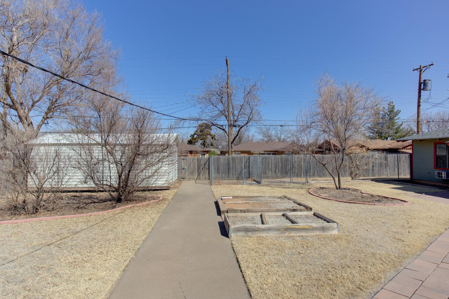 3410 40th Street Lubbock, TX 79413 - Photo 33 of 33 a view of a park with iron fence