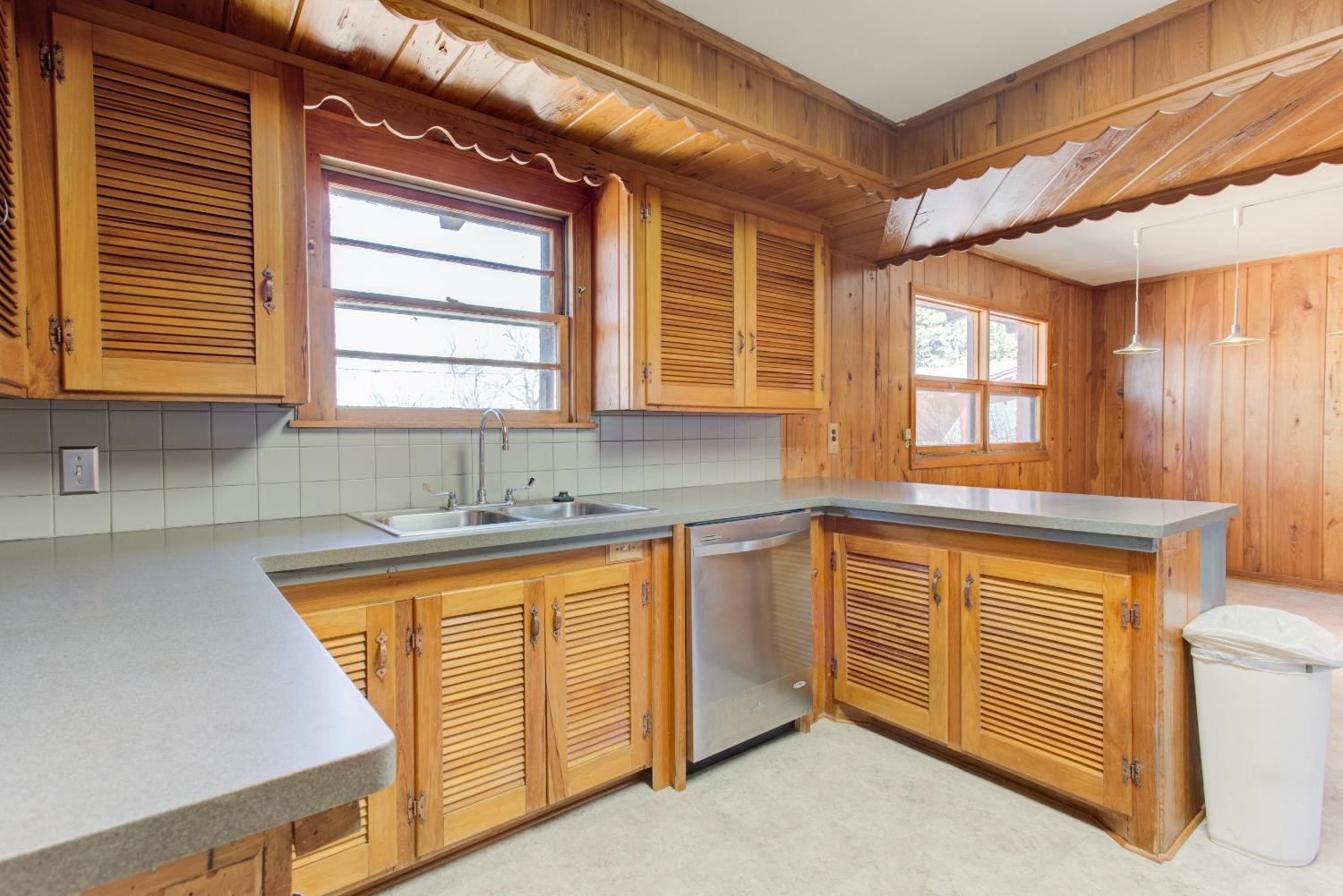 3410 40th Street Lubbock, TX 79413 - Photo 10 of 33 a bathroom with a sink and a bathtub