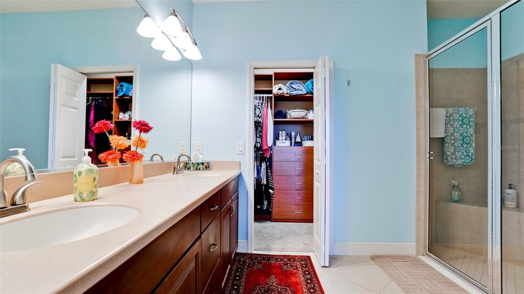 7401 Hamilton Road Bradenton, FL 34209 - Photo 14 of 35 a view of a bathroom sink and a mirror