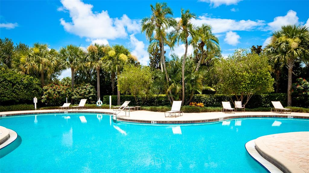 7401 Hamilton Road Bradenton, FL 34209 - Photo 30 of 35 a view of a swimming pool with a yard