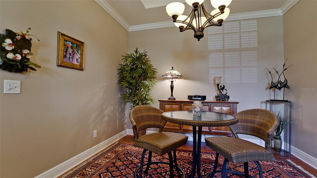 7401 Hamilton Road Bradenton, FL 34209 - Photo 7 of 35 a dining room with furniture and window